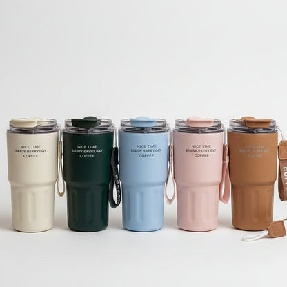 MSZM insulated coffee travel mugs lined up on a marble kitchen counter showing off cream, green, blue, pink, and brown color options.