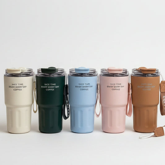 MSZM insulated coffee travel mugs lined up on a marble kitchen counter showing off cream, green, blue, pink, and brown color options.