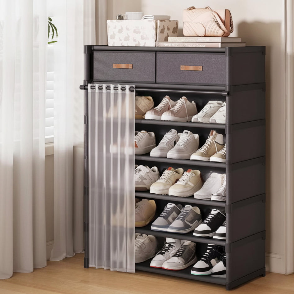 Multi-layer black shoe rack cabinet filled with sneakers and top storage drawers