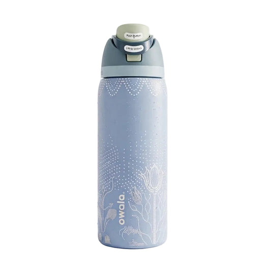Front view of the Owala 32oz Studded Garden Blue water bottle showcasing its floral dotted design   