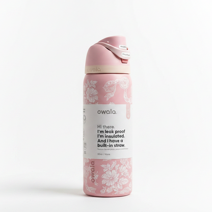 Front view of Owala FreeSip 32oz stainless steel water bottle in floral pink