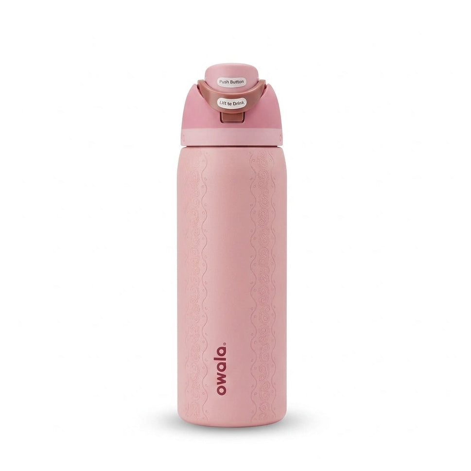 Front view of the Owala FreeSip 32oz Painted Canyon pink insulated water bottle standing upright   