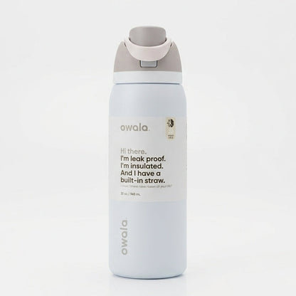 Front view of the Owala FreeSip 32 oz water bottle in Shy Marshmallow color against a clean white background