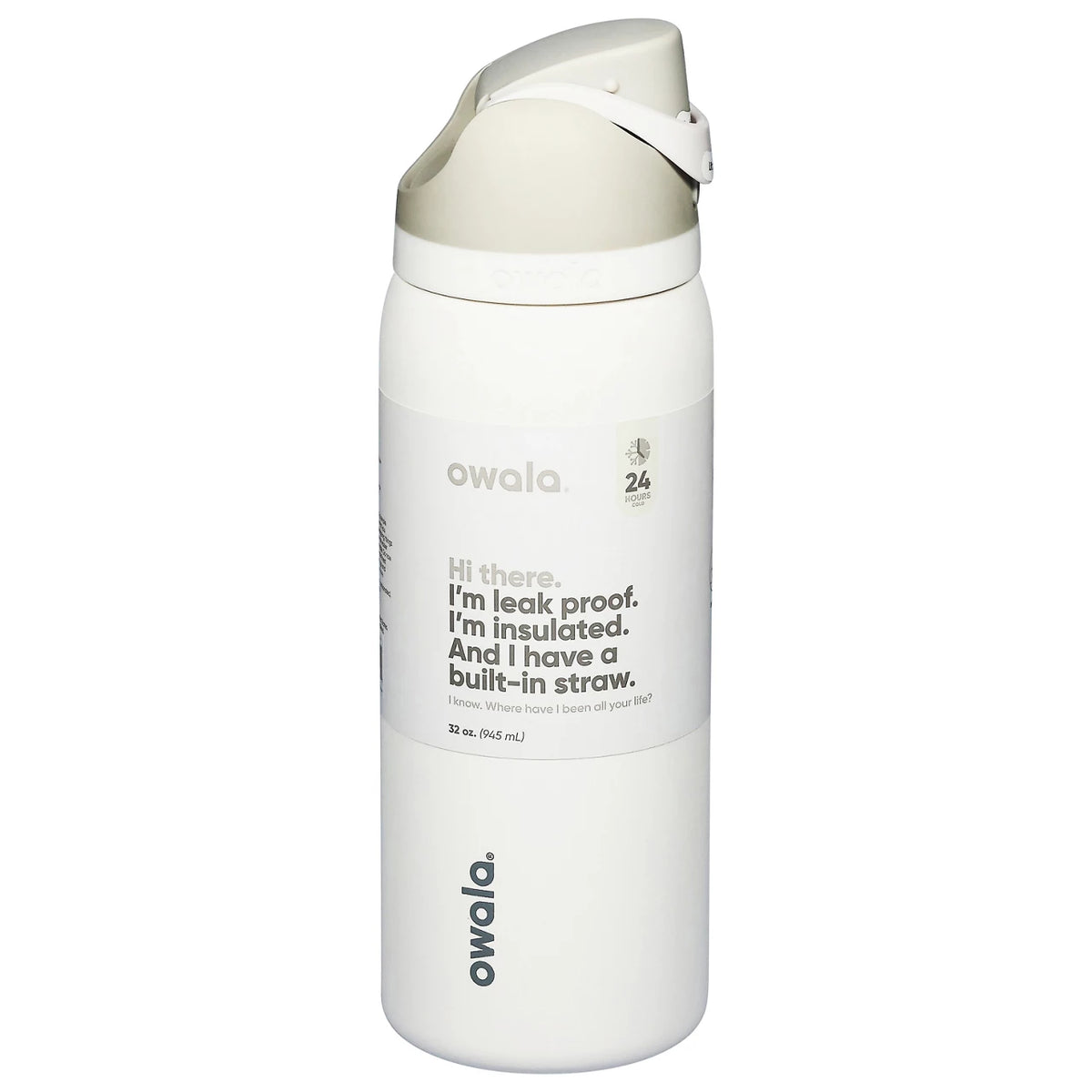 Owala FreeSip 32 oz insulated stainless steel water bottle in Shy Marshmallow color standing on marble kitchen counter.