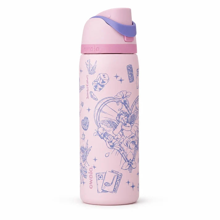 Owala FreeSip Cupid's Melody pink stainless steel water bottle standing on a marble kitchen counter next to white flowers.