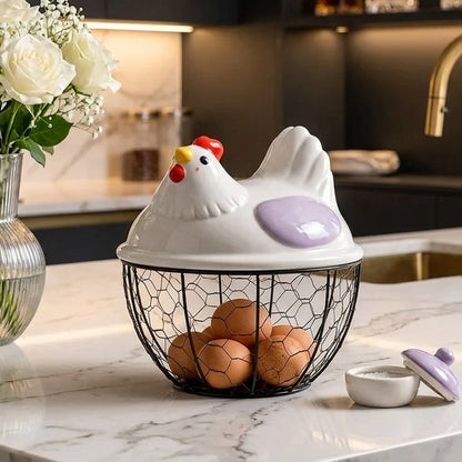 Plastic hen egg storage basket sitting on a white marble kitchen countertop next to flowers