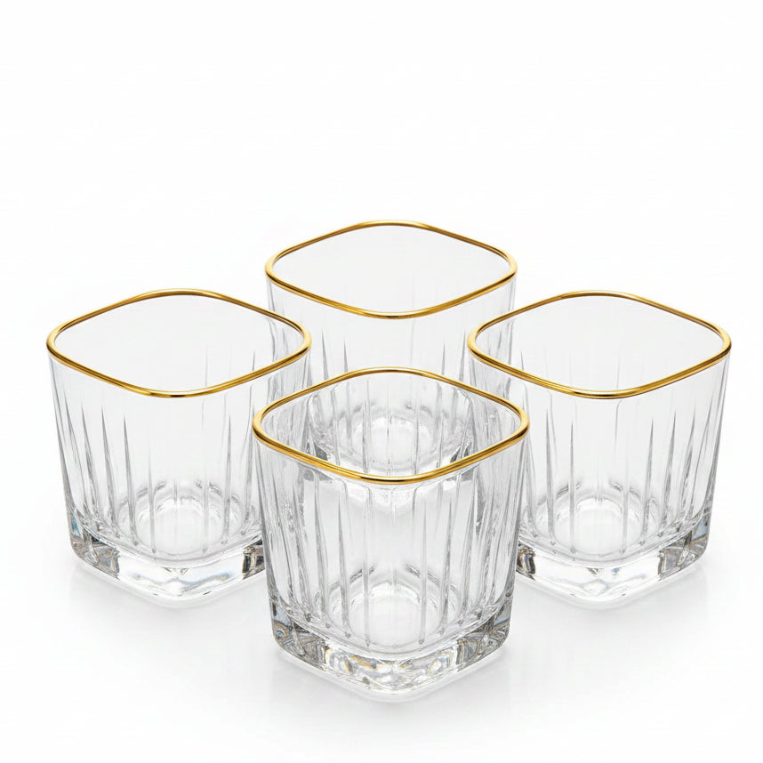 Luxe Gold Rim Crystal Glass Tumbler Set 6 Piece displayed elegantly on a modern dining table