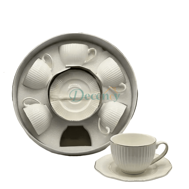 Premium white porcelain tea cup and saucer 12-piece set displayed on a dining table in Pakistan.