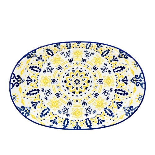 Top view of oval printed ceramic serving tray with vibrant blue and yellow mandala pattern