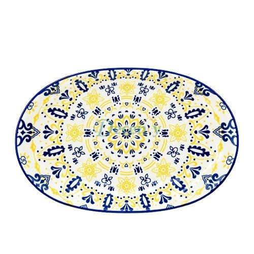 Top view of oval printed ceramic serving tray with vibrant blue and yellow mandala pattern