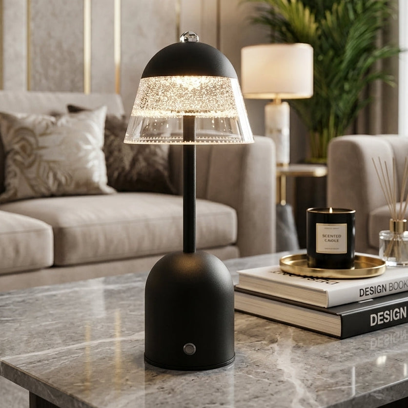 Modern black rechargeable crystal shade mushroom desk lamp placed on a living room table.