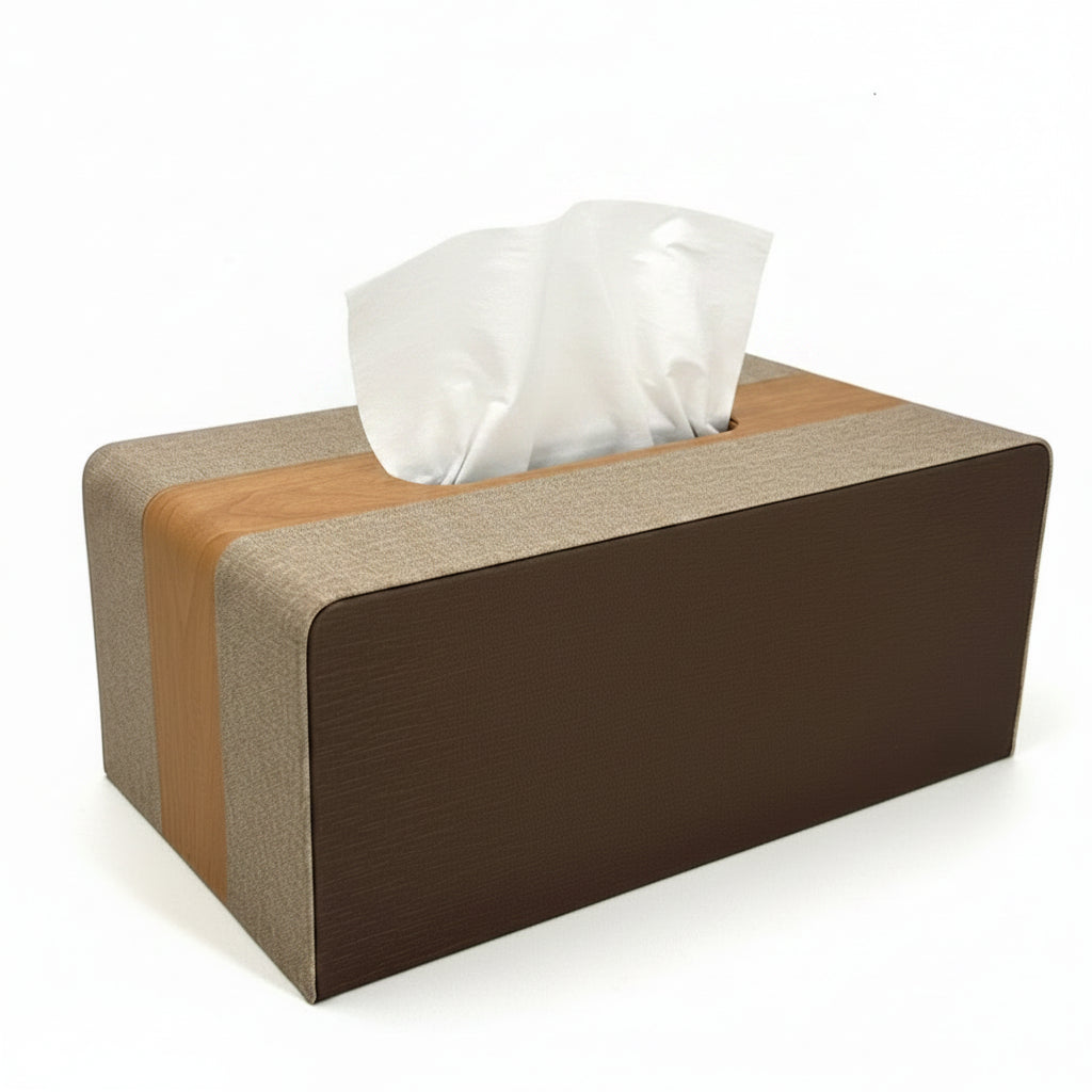 Elegant rectangular tissue dispenser in an executive office setting next to a laptop.