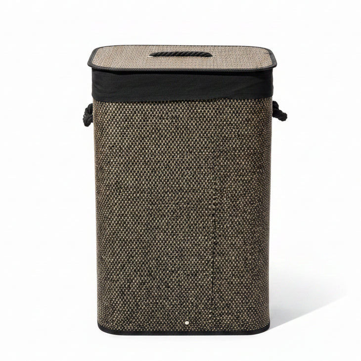 Front view of a rectangular woven dark brown laundry basket with lid on tile floor
