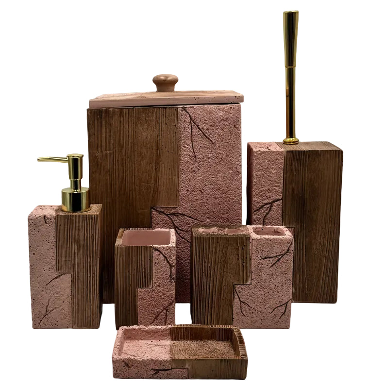 Close-up of the textured stone soap dispenser and toothbrush holder with rustic wooden accents.