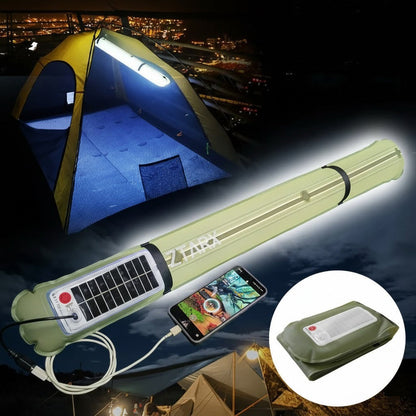 Inflatable LED solar camping light tube illuminating a camping tent at night   