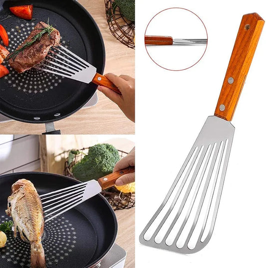 Stainless steel fish spatula with rivets on wooden handle isolated on white background