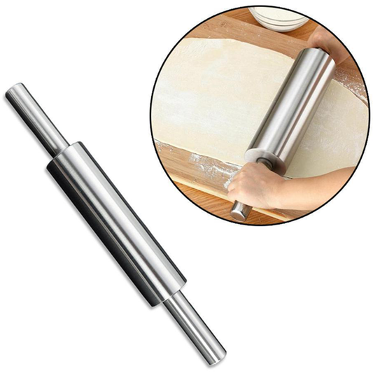 Stainless steel rolling pin being used to roll fresh roti dough on a wooden board.