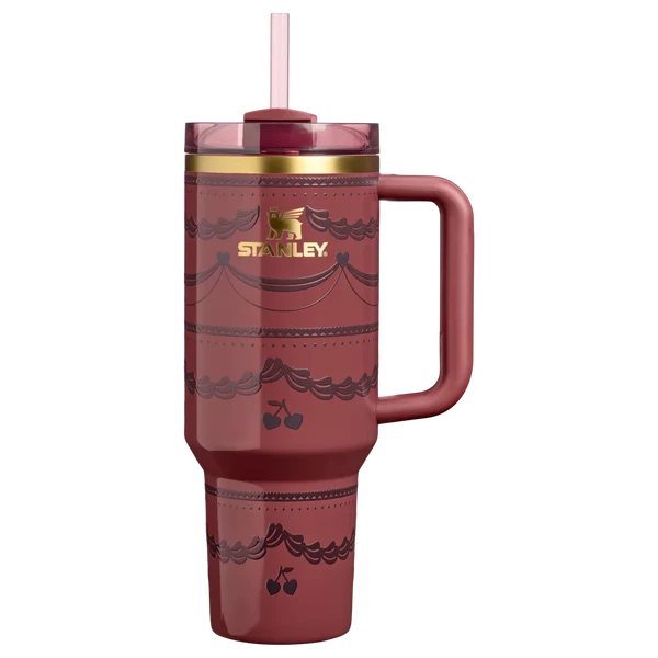 Stanley Quencher H2.0 40oz tumbler in deep Red Velvet Cake shade with gold accent rim.