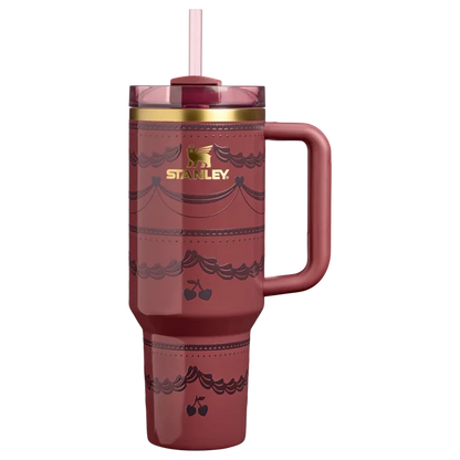Stanley Quencher H2.0 40oz tumbler in deep Red Velvet Cake shade with gold accent rim.