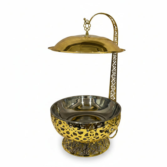 Texture golden 8L chafing dish food warmer with an ornate cut-out pattern stand on a marble counter