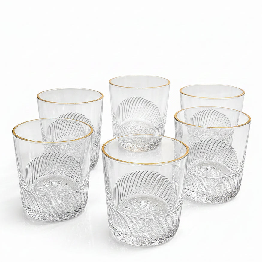 Luxe gold rim luxury textured glass set of 6 displayed elegantly on a Pakistani dining table.