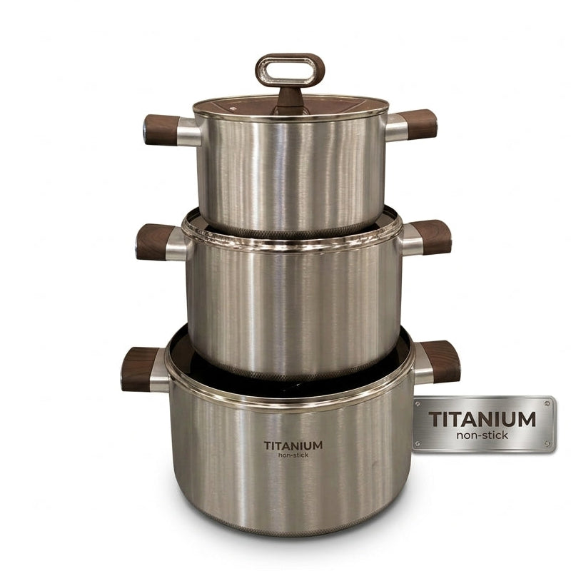 Three-piece stacked titanium non-stick cooking pot set with brushed stainless steel finish.