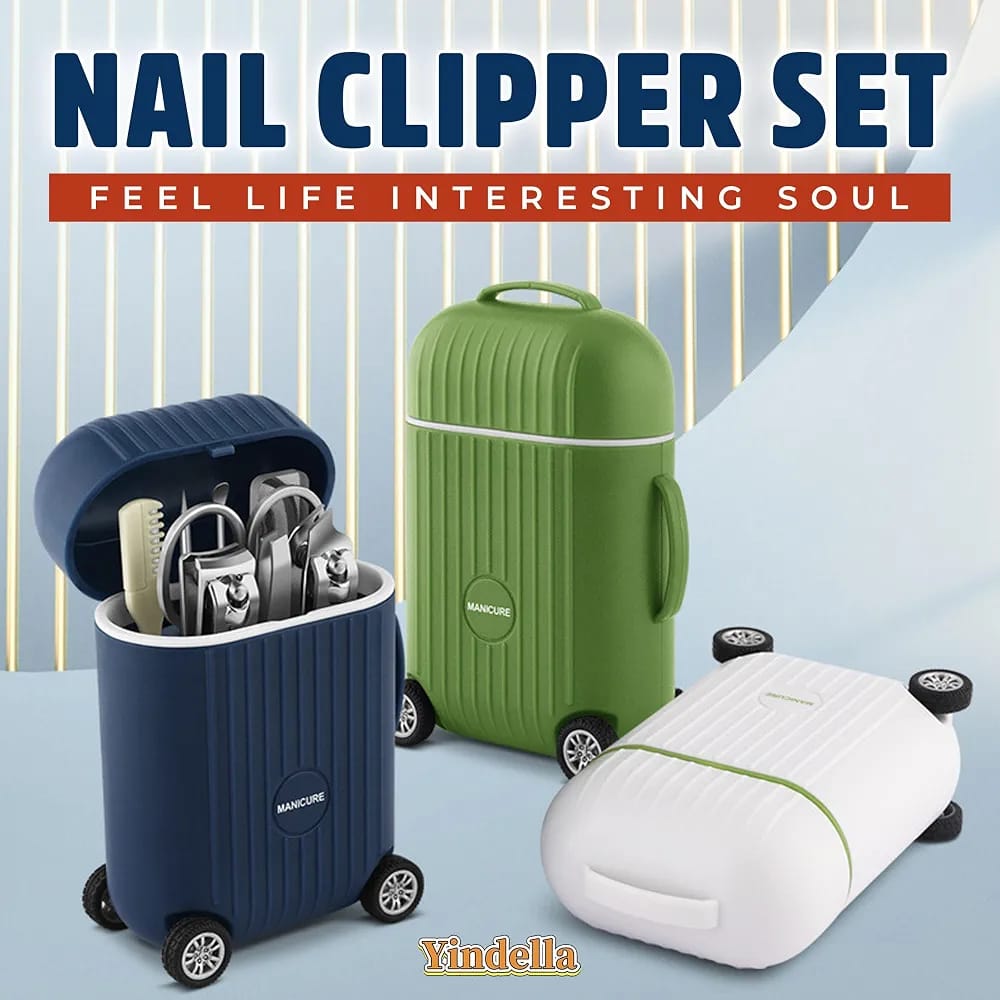 Travel manicure set neatly arranged beside a dark blue mini suitcase storage case.