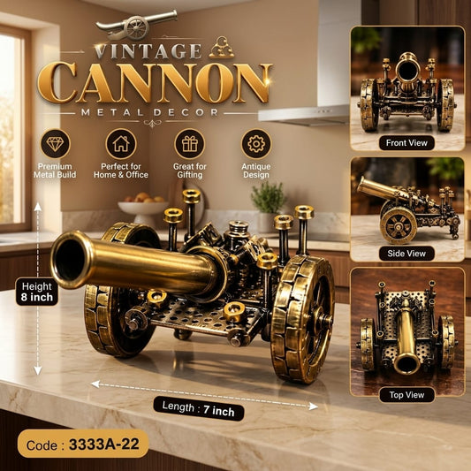 Vintage metal cannon decorative model on display on a marble table 