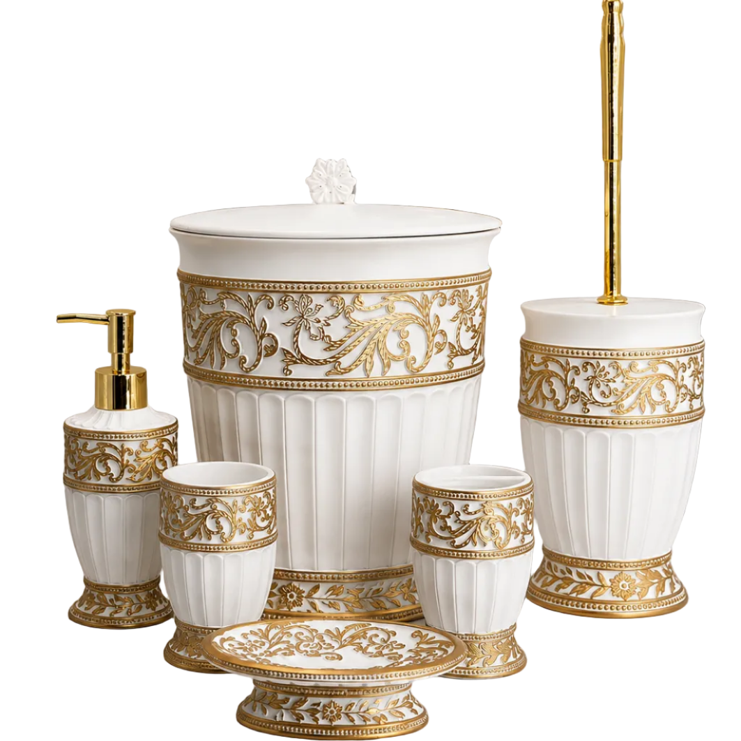  Close-up of the white and gold embossed liquid soap dispenser pump.