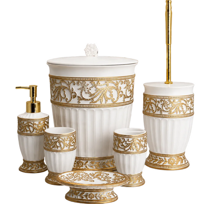 Close-up of the white and gold embossed liquid soap dispenser pump.