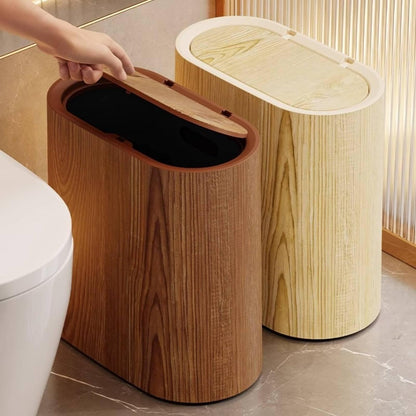 Dark and light wooden grain dustbins with press lid next to a modern toilet.