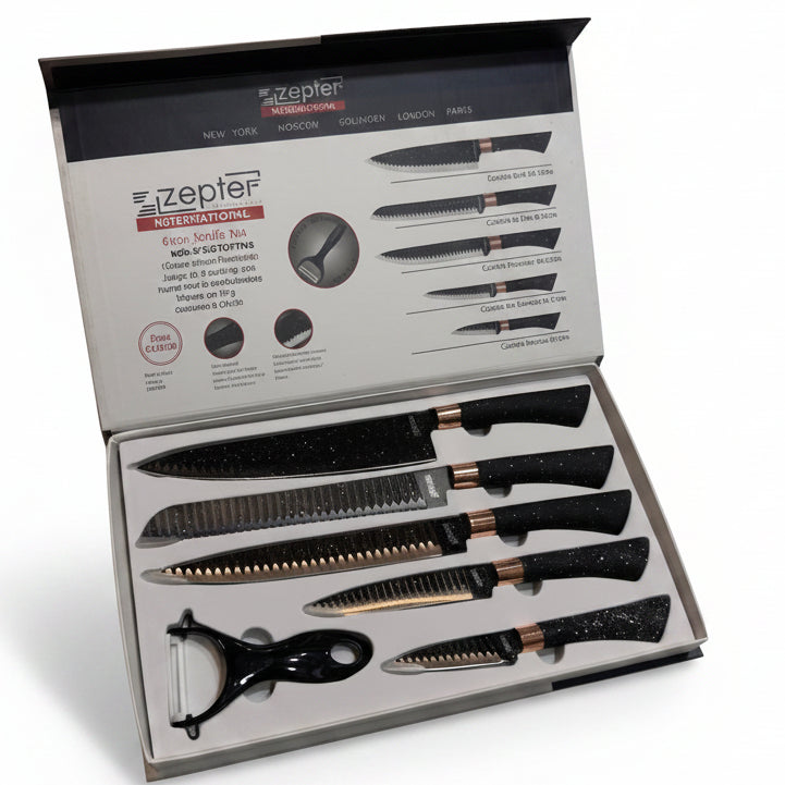 Open Zepter 6-piece knife set presentation box on a marble kitchen countertop